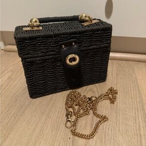 Elegant Black Woven Handbag with Gold Chain